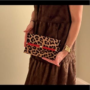DVF cheetah print clutch with red accent